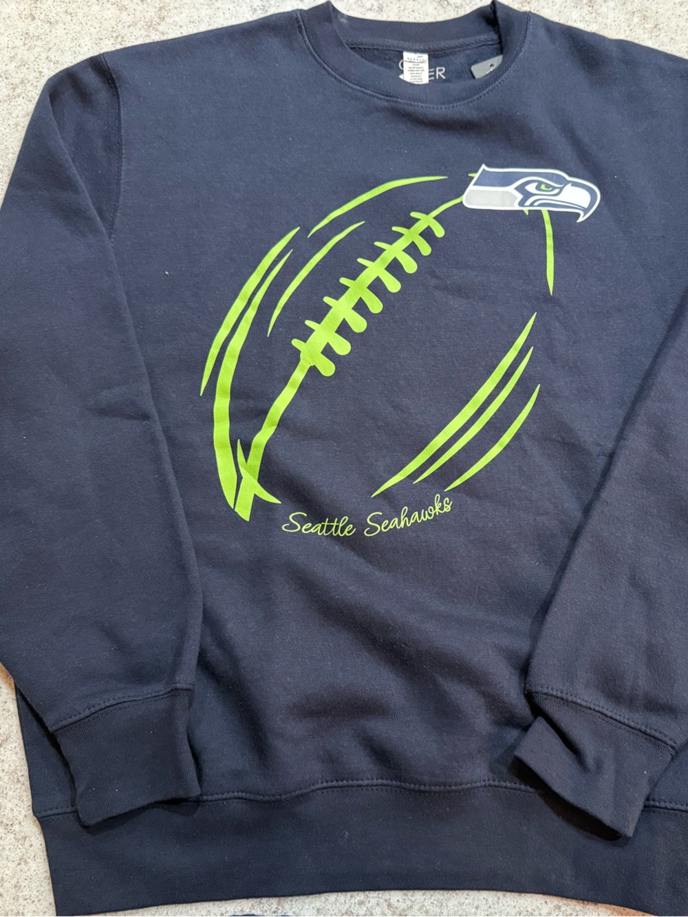 Seattle Seahawks Navy Crewneck Sweatshirt with Lime Football Graphic